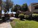 Well-maintained exterior grounds with mature landscaping and grass at 2228 N 52Nd St # 140, Phoenix, AZ 85008