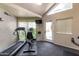 Community gym featuring treadmills, stationary bikes, and ample floor space at 2228 N 52Nd St # 140, Phoenix, AZ 85008