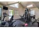 Community gym with modern exercise equipment and ample natural light at 2228 N 52Nd St # 140, Phoenix, AZ 85008