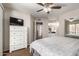 Spacious bedroom with view into ensuite bathroom and a bright, sunny atmosphere at 2228 N 52Nd St # 140, Phoenix, AZ 85008