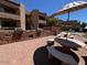 Community outdoor patio with brick accents, tables and chairs, and outdoor grills at 2228 N 52Nd St # 140, Phoenix, AZ 85008