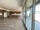Bright, open living space with tile floors and sliding glass doors to patio for indoor-outdoor lifestyle at 22669 E Saddle Way, Queen Creek, AZ 85142