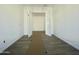 An additional space featuring white walls and a double door entrance at 22669 E Saddle Way, Queen Creek, AZ 85142