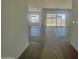 View of the living space, featuring tile flooring and patio access at 22669 E Saddle Way, Queen Creek, AZ 85142