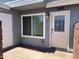 Unit 269 features a decorative glass front door and storm door in a bright and clean entryway at 2301 E University Dr # 269, Mesa, AZ 85213
