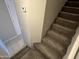 Carpeted staircase leading upstairs from the main level at 2301 E University Dr # 269, Mesa, AZ 85213