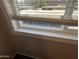 View from a window showing nearby apartments and covered parking spots at 2301 E University Dr # 269, Mesa, AZ 85213
