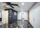 Room showcasing stylish tile flooring, a black accent wall, and ample space at 2430 W Papago St, Phoenix, AZ 85009