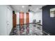 An airy room featuring stylish tile flooring, ceiling fan, curtains, and recessed lighting at 2430 W Papago St, Phoenix, AZ 85009