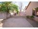 A brick patio adds charm to the backyard, creating a perfect spot for relaxation at 2533 N 114Th Ave, Avondale, AZ 85392