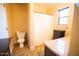 Bright bathroom featuring a shower with curtain, toilet, and vanity with a granite countertop at 2533 N 114Th Ave, Avondale, AZ 85392