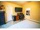 Spacious bedroom with an office area and a doorway view into the kitchen at 2533 N 114Th Ave, Avondale, AZ 85392