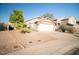 Charming single-story home featuring a low-maintenance desert landscape and spacious two-car garage at 2533 N 114Th Ave, Avondale, AZ 85392
