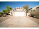Well-maintained home with a two-car garage and desert landscaping for easy upkeep at 2533 N 114Th Ave, Avondale, AZ 85392