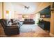 Spacious living room featuring a ceiling fan, tile flooring and comfortable seating at 2533 N 114Th Ave, Avondale, AZ 85392