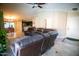 Comfortable living room with an open floor plan and stylish tile flooring at 2533 N 114Th Ave, Avondale, AZ 85392