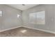 Neutral bedroom featuring plank flooring, a window, and neutral paint at 2918 E Silverbell Rd, San Tan Valley, AZ 85143