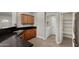 Spacious kitchen with stainless steel sink and fixtures, and wood-style flooring at 2918 E Silverbell Rd, San Tan Valley, AZ 85143