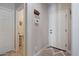 Inviting entryway with neutral tones, showing front door and adjacent space with storage at 3042 N Beverly Pl, Buckeye, AZ 85396
