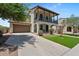 Charming two-story home with a well-manicured lawn and inviting curb appeal at 3042 N Beverly Pl, Buckeye, AZ 85396