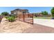 Spacious backyard with playground, basketball court, mature trees, and privacy fence at 3177 S Sierra St, Gilbert, AZ 85295
