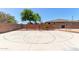 Private basketball court with full markings and basketball hoop, perfect for recreational play at 3177 S Sierra St, Gilbert, AZ 85295