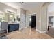 Spacious bathroom with double vanity, a make-up counter and closet access at 3177 S Sierra St, Gilbert, AZ 85295
