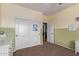 Bedroom featuring sliding door closet, neutral color paint, and carpet flooring at 3177 S Sierra St, Gilbert, AZ 85295