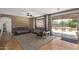 Inviting living room with sliding glass doors to outdoor patio and comfortable sofa seating at 3177 S Sierra St, Gilbert, AZ 85295