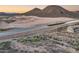 This aerial shows the community and surrounding desert landscape at 32359 N 129Th Dr, Peoria, AZ 85383