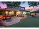Outdoor kitchen and covered patio create a perfect outdoor living space at 32359 N 129Th Dr, Peoria, AZ 85383