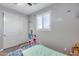 Light and airy bedroom showcasing storage space and a cozy bed for your comfort at 32359 N 129Th Dr, Peoria, AZ 85383