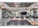 Up close image of large gray kitchen island with gas cooktop and seating at 32359 N 129Th Dr, Peoria, AZ 85383