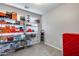 Large storage room with wall to wall shelving at 32359 N 129Th Dr, Peoria, AZ 85383