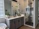 Modern bathroom with glass shower, subway tile, and updated fixtures at 3765 N Denny Way, Buckeye, AZ 85396