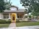 Charming two-story home with manicured landscaping and a cozy front porch at 3765 N Denny Way, Buckeye, AZ 85396