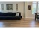 Open-concept living room with comfortable seating and stylish decor at 3765 N Denny Way, Buckeye, AZ 85396