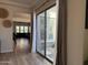 View of open floor plan with sliding glass door access to outdoor patio at 3765 N Denny Way, Buckeye, AZ 85396