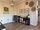 Charming playroom featuring built-in storage, decorative wall art, and wood-look floors at 3765 N Denny Way, Buckeye, AZ 85396