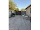 Enclosed backyard with a BBQ grill and block wall fence at 3946 W Holly St, Phoenix, AZ 85009