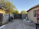 Enclosed backyard with a BBQ grill and block wall fence at 3946 W Holly St, Phoenix, AZ 85009
