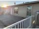 Cozy home exterior featuring a brick-paved patio and neutral siding, with a glimpse of the peaceful neighborhood at 3946 W Holly St, Phoenix, AZ 85009