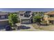 Beautiful home with a view of the lake and community park at 41581 W Somerset Dr, Maricopa, AZ 85138