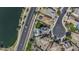 Aerial view highlighting the neighborhood with a community lake and parks at 41581 W Somerset Dr, Maricopa, AZ 85138
