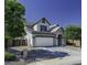 Charming two-story home featuring a large two-car garage and a low maintenance landscaped front yard at 41581 W Somerset Dr, Maricopa, AZ 85138