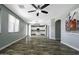 Open floor plan featuring dining and kitchen area with hard surface floors at 41581 W Somerset Dr, Maricopa, AZ 85138