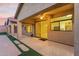 Covered patio with view to kitchen, fan, and step stones at 4208 E Hamblin Dr, Phoenix, AZ 85050