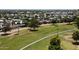 Aerial view of a well-maintained walking path near community homes and green spaces at 427 S 80Th Way, Mesa, AZ 85208