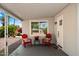 Relaxing covered patio with comfortable seating, offering a perfect spot to enjoy the outdoors at 427 S 80Th Way, Mesa, AZ 85208