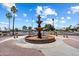 Beautiful fountain surrounded by manicured landscaping and benches, creating a relaxing ambiance at 427 S 80Th Way, Mesa, AZ 85208